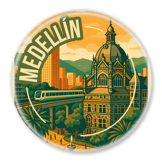 Round magnet with illustration of Medellín, Colombia. Palacio de la Cultura, tram, and city skyline in yellow-orange tones.